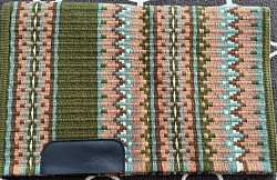 Olive green base with tans and blue accents $195