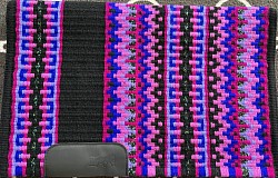 Black base, pinks purples and royal blue accents . Does contain metallics. $195