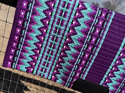 Purple base with purples, teal and white accents $195