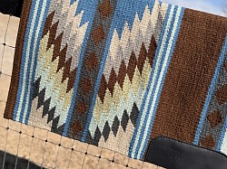 Brown base with blues, green and gray accents $195