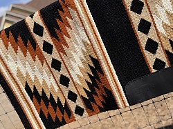 Black base with tan, rust and white accents $195